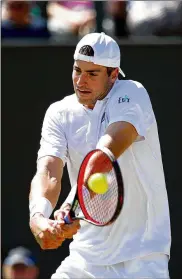  ?? CLIVE BRUNSKILL / GETTY IMAGES ?? “I think Atlanta can definitely be a springboar­d for success for me,” said John Isner, 34. He says the 37-yearold Roger Federer inspires him.