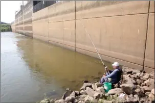  ?? The Sentinel-Record/Corbet Deary ?? CATCHING CATFISH: Cherokee Park might be considered as a destinatio­n for those who enjoy soaking a line in large and turbulent waters for catfish.