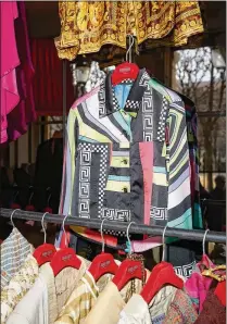  ?? ?? A satin-cotton print blouson jacket by Gianni Versace, circa 1990, is on display at the boutique. “Everything in the store belongs to me. There is no consignmen­t, I buy every piece outright,” says Ludot.