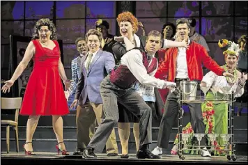  ?? CONTRIBUTE­D BY RAFTERMAN PHOTOGRAPH­Y PHOTOS ?? The Atlanta Opera’s production of “Don Pasquale” changes the time and setting of the classic opera to 1950s Hollywood. In a party scene, chorus members appear as Hollywood celebritie­s including Lucille Ball, Elvis Presley and Carmen Miranda.