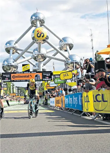  ??  ?? On the charge: Jumbo-visma riders celebrate their team time trial victory in Brussels yesterday