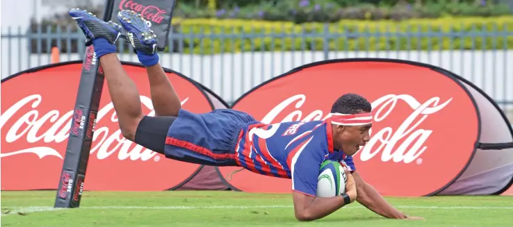  ?? Photo: Jone Luvenitoga ?? Rupeni Mataele of Marist Brothers High School Under-14 dives to score against Lelean Memorial School in the Coke Zero Deans Trophy quarterfin­al at the ANZ Stadium, Suva on July 29, 2017.