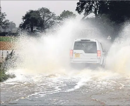  ??  ?? Above (from left) — flooding on the A934 Forfar to Montrose road.