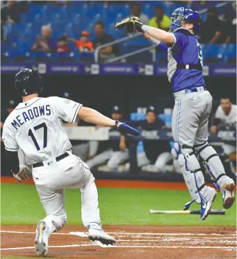  ?? JULIO AGUILAR/GETTY IMAGES FILES ?? It’s rumoured the Blue Jays, seen here on the road against the Tampa Bay Rays last September, will open their season on July 24 at Tropicana Field.
