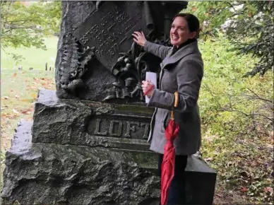  ?? PHOTOS BY JOHN BREWER — ONEIDA DAILY DISPATCH ?? Oneida Community Mansion House’s Curator of Education Molly Jessup led visitors on an informativ­e tour of the Oneida Community Cemetery, discussing the role of death in the utopian society on Saturday, Oct. 29.