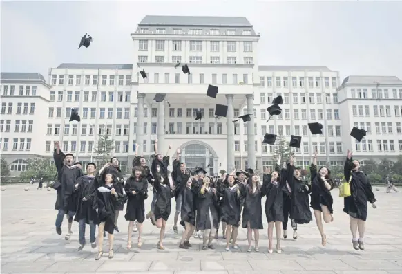  ?? PICTURE: ED JONES/AFP VIA GETTY IMAGES ?? Many Chinese students come to Scotland to study, paying fees that are vital to Scottish universiti­es