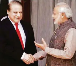  ?? REUTERS PIC ?? Indian Prime Minister Narendra Modi with Pakistan’s ousted premier, Nawaz Sharif. India-Pakistan relations have always been rocky.