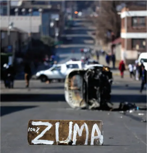  ??  ?? Violent protests erupted in South Africa following the arrest of former president Jacob Zuma