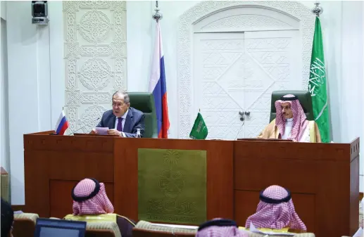  ?? (Russian Foreign Ministry/Handout via Reuters) ?? SAUDI ARABIAN Foreign Minister Prince Faisal bin Farhan Al-Saud listens as Russia Foreign Minister Sergei Lavrov speaks at a news conference in Riyadh on March 10.