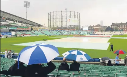  ??  ?? n A handful of spectators stayed on at The Kia Oval in the vain hope of seeing some play on the fourth day.