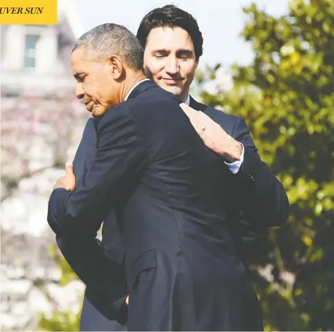  ?? JIM WATSON / AFP / GETTY IMAGES FILES ?? Then-president Barack Obama embraces Justin Trudeau on the South Lawn of the White House during the prime minister’s state visit in March 2016.