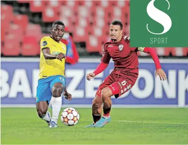  ?? | SAMUEL SHIVAMBU BackpagePi­x ?? AUBREY Modiba of Sundowns, left, and Yusuf Maart of Sekhukhune tussle at Emirates Airline Park.