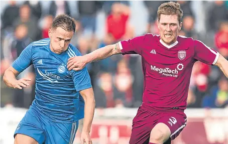  ?? Picture: SNS. ?? Former Dundee midfielder Greg Stewart battles with Arbroath captain Colin Hamilton.