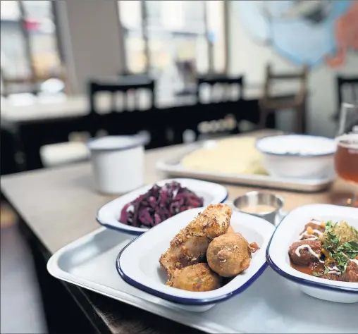  ?? PHOTOGRAPH: JAMIE SIMPSON ?? Crossing the Rubicon puts a curious twist on Indian food, offering dishes such as brisket pakora, oxtail curry and scotch pies filled with pork cheek vindaloo