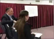  ?? EVAN BRANDT — MEDIANEWS GROUP ?? Developer John Benson, left, waits to address the Upper Pottsgrove Commission­ers at the Nov. 18 meeting.