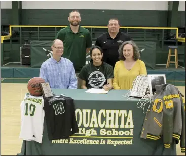  ?? Photo by Gerren Smith ?? SIGNING DAY: Ouachita Lady Warrior Lizzy Rowton signed a National Letter of Intent to play basketball at Crowley’s Ridge College Monday at the Ouachita High School Gymnasium. Joining Rowton, parents Keith and Aleta Rowton, and Ouachita Lady Warriors basketball head coach Corey Brown and Crowley’s Ridge College head women’s basketball coach Brad Phillips.