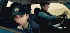  ?? Briarclif f / Open Road ?? MIGUEL ( Jacob Perez), a migrant from Mexico, and Jim ( Liam Neeson), a rancher in Arizona, f lee cops and a cartel in Robert Lorenz’s “The Marksman.”