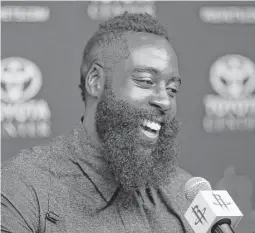 ?? Karen Warren / Houston Chronicle ?? James Harden speaks during a news conference Saturday after he agreed to a four-year, $118 million renegotiat­ion that could keep him under contract with the Rockets through 2020.
