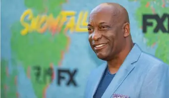  ?? GETTY IMAGES FILE ?? ‘PROUD OF THE DIRECTION’: John Singleton arrives for the premiere of FX’s ‘Snowfall’ Season 2 in Los Angeles. Singleton, director of the iconic 1991 movie ‘Boyz n the Hood,’ died in April.