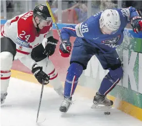  ?? THE ASSOCIATED PRESS ?? Corey Perry, left, who won Olympic gold in 2010 and 2014, says NHLers want to compete because it’s a “unique event.”