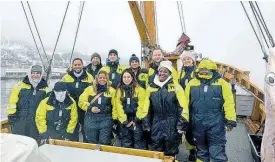  ?? ?? The crew and guests take a pic on board the fishing vessel.