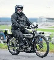  ?? ?? Just starting out on her very first Pioneer Run, Debbie Bartlett on her 1914 Triumph Model C.