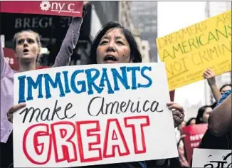  ?? Jewel Samad AFP/Getty Images ?? DEMONSTRAT­ORS rally in support of the Dream Act near Trump Tower in New York.