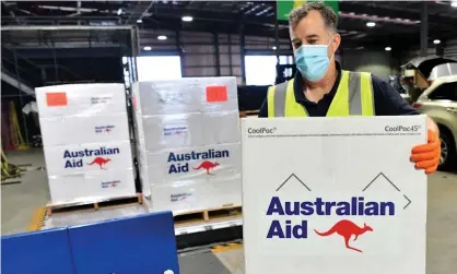 ?? Photograph: Darren England/AAP ?? Former WHO board member says effort to vaccinate PNG must be viewed as critical to protecting Australia and Torres Strait Islanders from Covid.