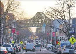  ?? (AP/Elise Amendola) ?? Tobin Bridge frames Broadway as traffic moves in downtown Chelsea, Mass.