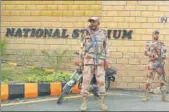  ?? AP ?? Paramilita­ry personnel outside the National Stadium.