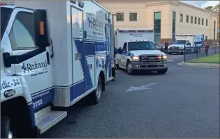  ?? / Contribute­d ?? A trio of Redmond EMS ambulances went down to help at Gulf Coast Medical Center in Panama City, Fla., following the damage inflicted on the facility by the landfall of Hurricane Matthew.