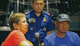  ?? BULLIT MARQUEZ / ASSOCIATED PRESS ?? Teodora and Fernando Carlos, the parents of the gunman who stormed the Resorts World Manila complex, speak during a press conference on Sunday, apologizin­g for the deeds of their son Jessie Carlos.