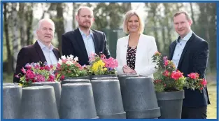  ?? ?? Paltech, a sister company of Green Generation, Tesco’s food waste partner, makes new flowerpots made of 100% recycled soft plastic which are sold in Tesco stores. Pictured with Green Generation directors Billy Costello (left) and Paul Costello (right) are Joe Manning, Tesco Commercial Director, and Pippa Hackett, Minister of State