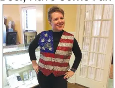  ?? Photo courtesy Clinton House Museum ?? Flannery Quinn, historian at the Clinton House Museum, models a “very patriotic” sequined vest worn at the 1996 Democratic National Convention. “Wear Your Politics” will be the theme of the first History Happy Hour Feb. 19 at the Fayettevil­le museum, a collaborat­ion with the Fayettevil­le Ale Trail.