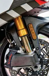  ??  ?? BELOW: Carbon-fibre ducts direct a cooling stream of air on to the brakes