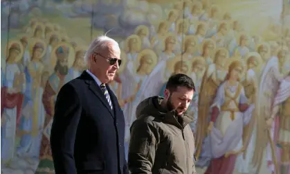  ?? Photograph: Reuters ?? President Joe Biden walks with Ukrainian President Volodymyr Zelenskiy at St Michael’s Golden-Domed Cathedral during his unannounce­d visit to Kyiv.