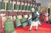  ?? REUTERS ?? ■ Prime Minister Narendra Modi plays an instrument during his visit to Hubei Provincial museum in Wuhan, China, on Friday.