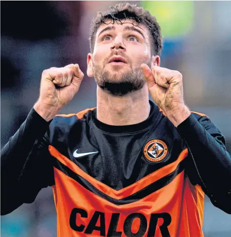  ?? Picture: SNS Group. ?? Turkish striker Nadir Ciftci after scoring for the Tangerines against Celtic in 2015.
CIFTCI TARGET: From back page