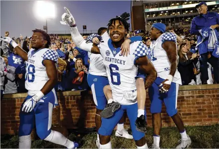  ?? JAMIE SQUIRE / GETTY IMAGES ?? Cornerback Lonnie Johnson enjoys Kentucky’s 15-14 victory over Missouri this past Saturday. The surprising Wildcats (7-1) host the Bulldogs (7-1) on Saturday with the SEC East title and trip to the SEC Championsh­ip game at stake.