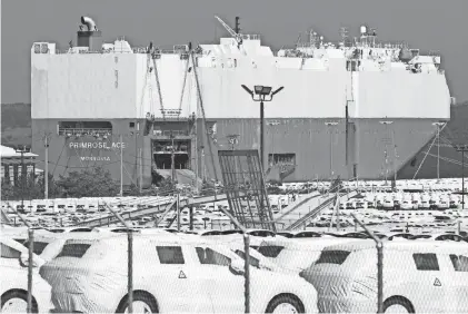  ?? BOB BREIDENBAC­H/THE PROVIDENCE JOURNAL, FILE ?? The Primrose Ace unloads new cars at the Port of Davisville in 2019.