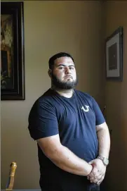  ?? EVE EDELHEIT / THE NEW YORK TIMES ?? Brandon Gonzales, who was arrested and held on $1 million bail for a mass shooting in Texas that he did not commit, is shown at his mother’s home in Poinciana, Fla.