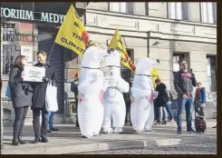  ?? — AP ?? Poland: Activists dressed in polar bear costumes calling for nuclear energy to replace fossil fuels on the sidelines of a climate march in Katowice.