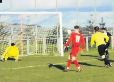  ??  ?? On target Simeon nets the rebound from his own penalty kick.