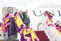  ?? HAIYUN JIANG AP ?? Vice President Kamala Harris and her husband Doug Emhoff wave before departing Don Mueang Internatio­nal Airport in Bangkok, Thailand, en route to the Philippine­s on Sunday.