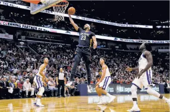  ?? Sean Gardner / Getty Images 2017 ?? Anthony Davis of the Pelicans makes a layup against the Warriors at Smoothie King Center in New Orleans in October. Davis might be the premier big man in the NBA.