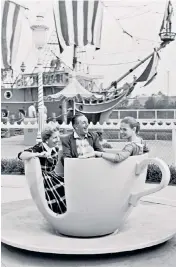  ?? ?? Family favourite: Walt Disney, his wife, Lillian, and their daughter Diane at Disneyland shortly after its opening in 1955
Mouse in the house: Mickey, the Disney mascot