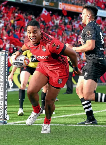  ?? GETTY IMAGES ?? David Fusitu’a reacts after scoring a try for Tonga against the Kiwis in Hamilton yesterday.