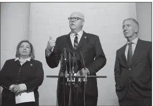  ?? The New York Times/TOM BRENNER ?? Rep. Joseph Crowley (center), D-N.Y., and fellow Democratic lawmakers Linda Sanchez of California and Richard Neal of Massachuse­tts speak out Tuesday on the GOP tax-overhaul proposal.