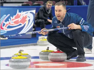  ?? CANADIAN PRESS FILE PHOTO/ADRIAN WYLD ?? In this Dec. 3, 2017 file photo, Brad Gushue calls to his sweepers as a rock approaches the house during Olympic curling trials action in Ottawa. The Gushue rink is among 12 from around the world that will compete in the Continenta­l Cup, beginning...