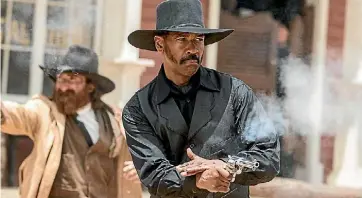  ??  ?? Denzel Washington is one of the many curious casting choices in The Magnificen­t Seven.